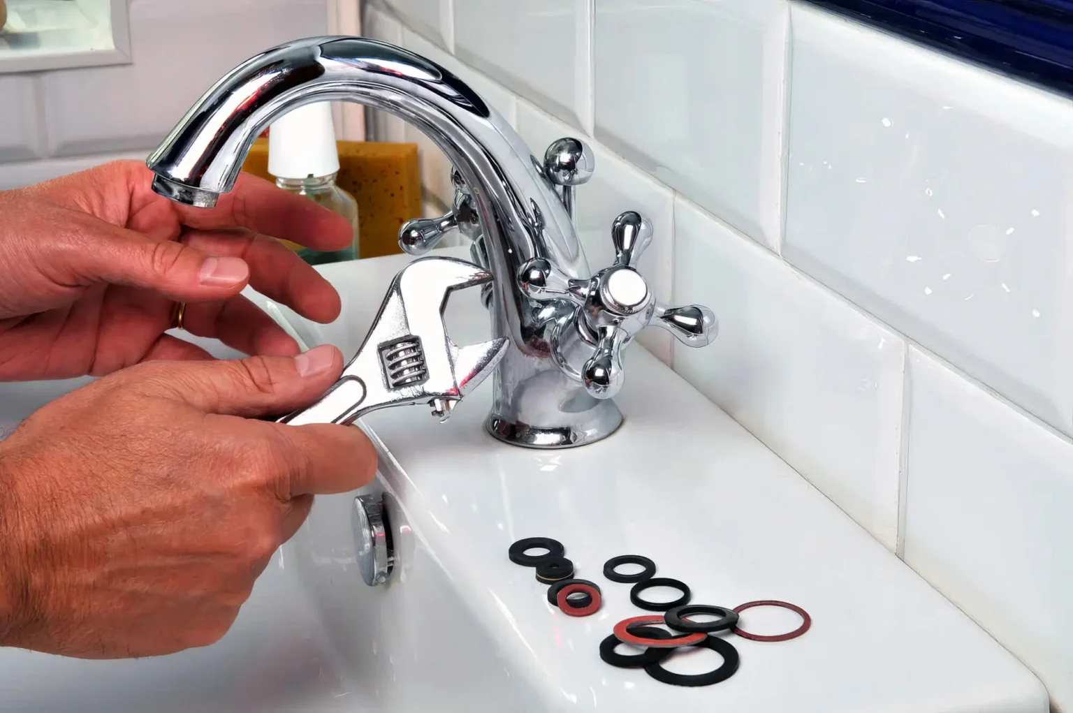 Plumber maintaining a bathroom faucet in Covina